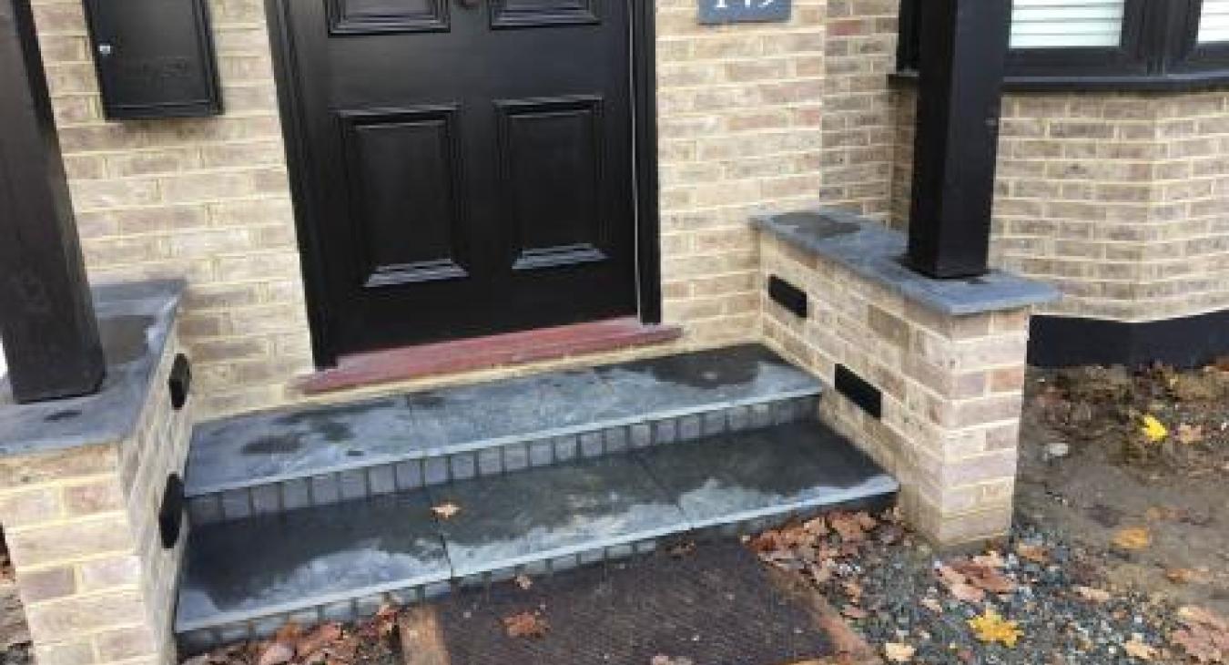 Brick lights installed in front porch steps in Petts Wood